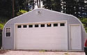  This P-Series Steel panel arch building is 25' wide and makes the perfect 2-car garage for the low budget client; specially those who need heavy snow, wind or seismic requirements.