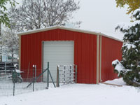 A 24 x 40 bright red Armor Steel Building may be the perfect solution to brighten and beautify your Christmas winter setting. It will solve the garage, storage and workshop problem too.