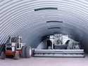 Steel Panel Arch buildings can come as wide as 70' wide and any length to meet your farm or ranch needs.  The modified arch can allow much more clearance and less construction cost than conventional farm or ranch buildings.