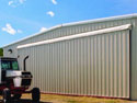 Your Farm or Ranch steel building can be designed for Bi-fold doors or sliding doors to accommodate the extra wide requirements of combines, airplanes or other types of equipment.