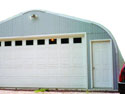 This P-Series Steel panel arch building is 25' wide and makes the perfect 2-car garage for the low budget client; specially those who need heavy snow, wind or seismic requirements.